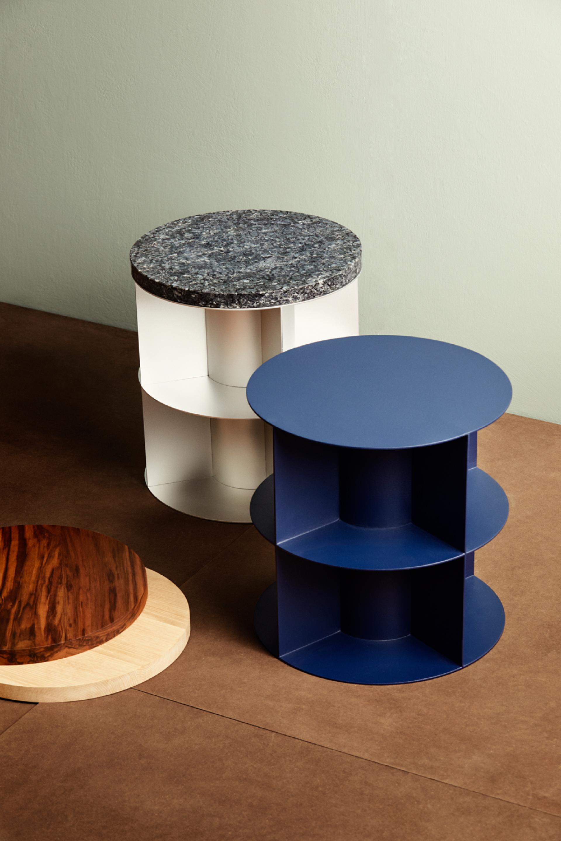 Modern furniture design featuring unique table styles in various materials, emphasizing sustainability and community aesthetics at Salone Norway.