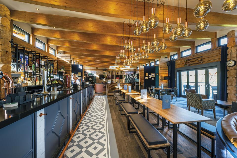 Stylish interior of The Muddy Oar in Stratford-Upon-Avon, featuring nautical decor and Karndean designs.