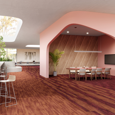 Modern workspace featuring IVC Commercial's Rudiments carpet tiles, stylish seating, and vibrant design elements for a productive environment.